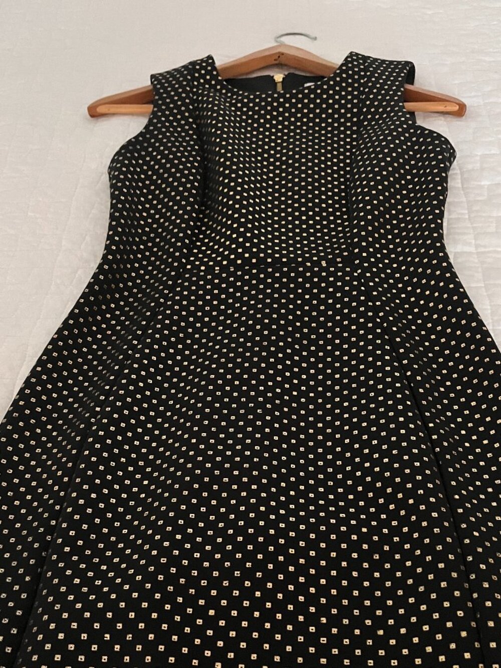 Calvin Klein dress with gold button pattern.